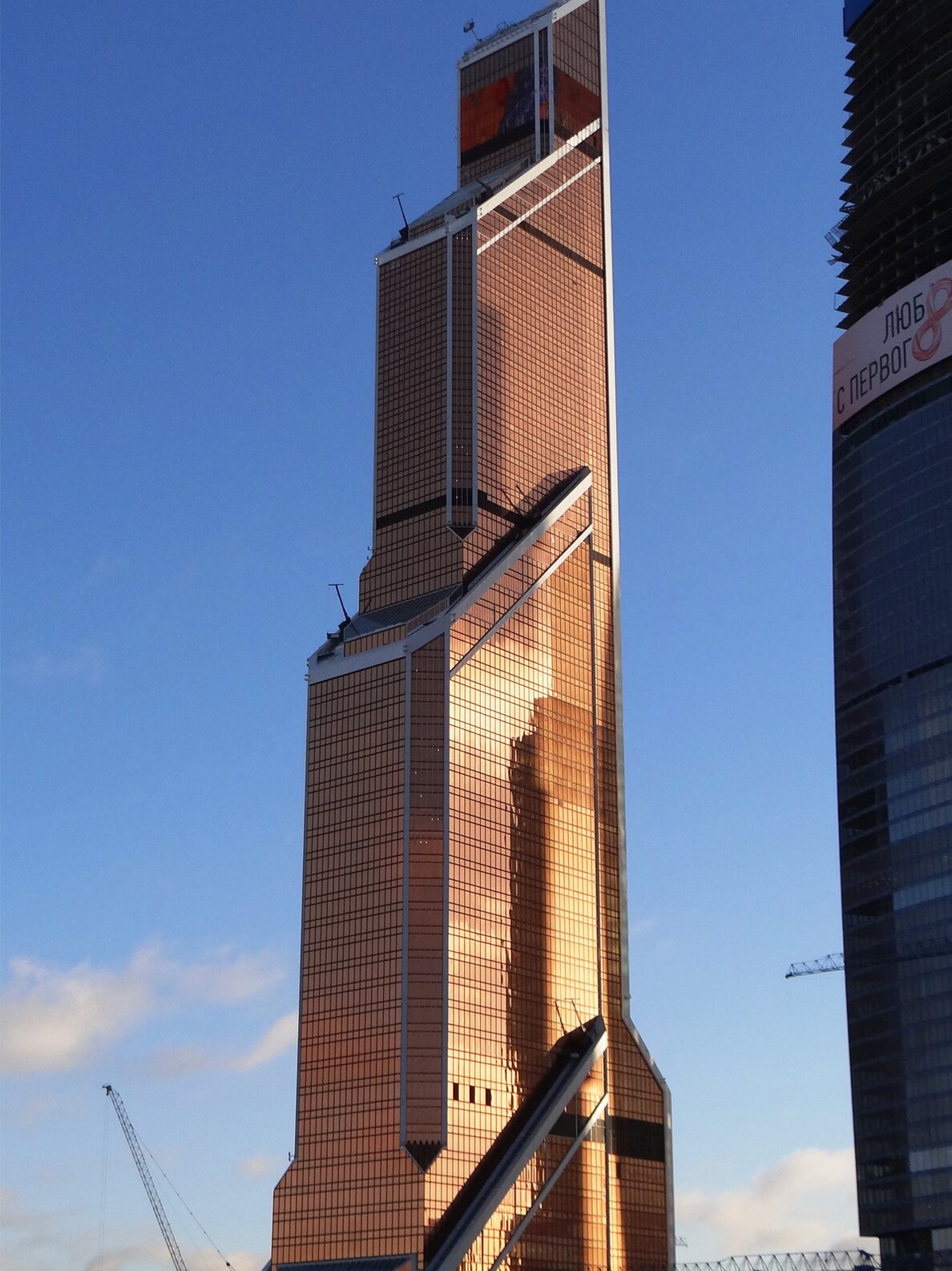 "Mercury City Tower", Fassadenverkleidung aus Aluminium und Edelstahl | © Josef Gartner GmbH